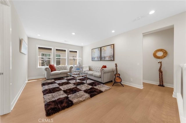 390 Riverbend, Lake Forest, CA 92630 - living area with light wood-type flooring and recessed lighting