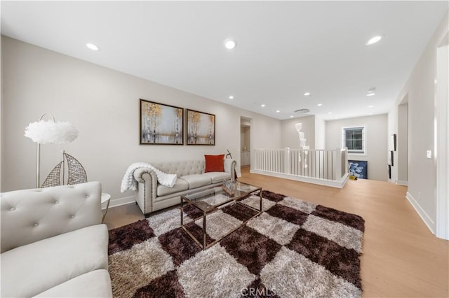 390 Riverbend, Lake Forest, CA 92630 - living area with light wood-style floors and recessed lighting