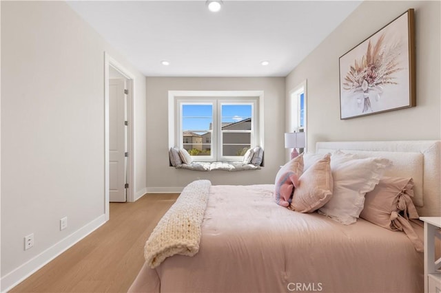 390 Riverbend, Lake Forest, CA 92630 - bedroom with light wood-style flooring and recessed lighting