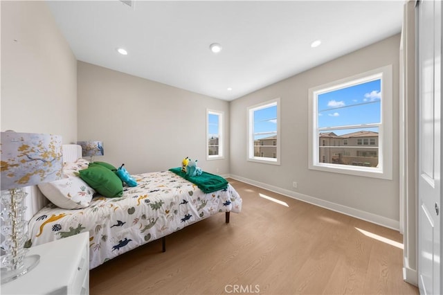 390 Riverbend, Lake Forest, CA 92630 - bedroom with light wood-type flooring and recessed lighting