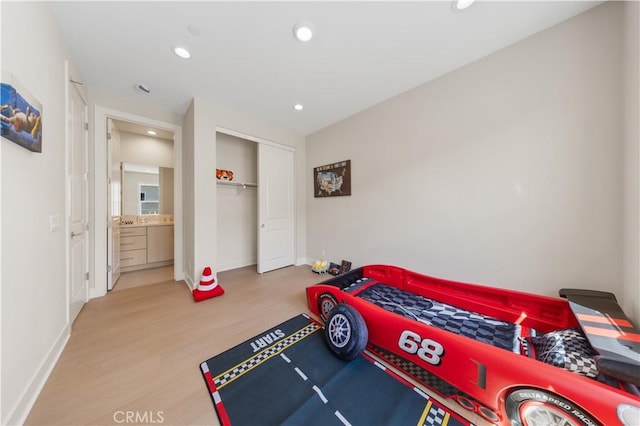 390 Riverbend, Lake Forest, CA 92630 - bedroom with wood finished floors, recessed lighting, and a closet