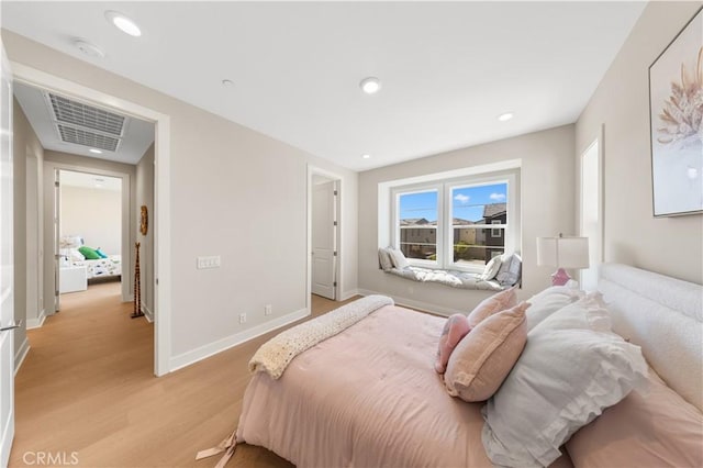 390 Riverbend, Lake Forest, CA 92630 - bedroom with light wood finished floors and recessed lighting
