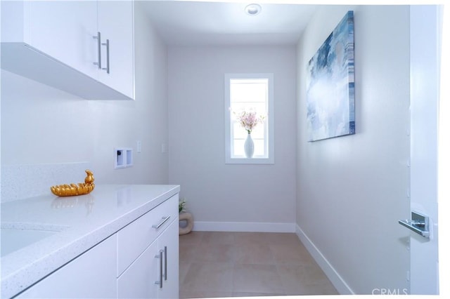 390 Riverbend, Lake Forest, CA 92630 - laundry area with cabinet space and hookup for a washing machine