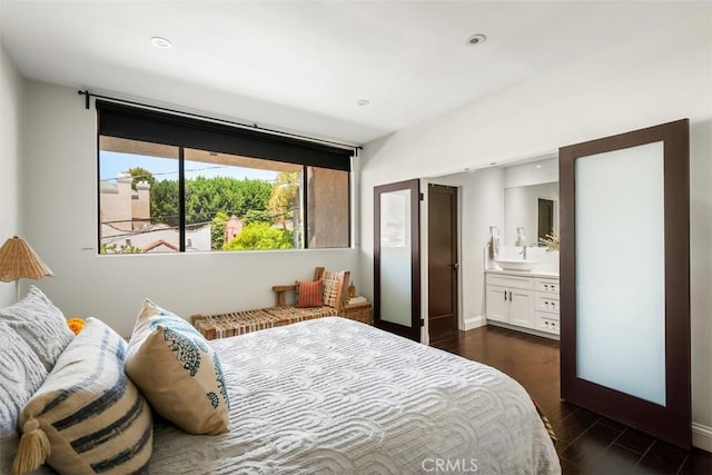 930 N Wetherly Dr Unit 201, West Hollywood, CA 90069 - bedroom featuring dark wood finished floors, recessed lighting, and ensuite bath
