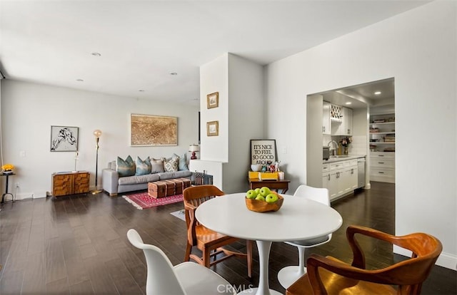 930 N Wetherly Dr Unit 201, West Hollywood, CA 90069 - dining space featuring dark wood finished floors and recessed lighting