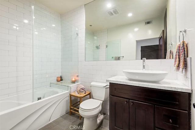 930 N Wetherly Dr Unit 201, West Hollywood, CA 90069 - bathroom featuring vanity, tile walls, and shower / tub combination
