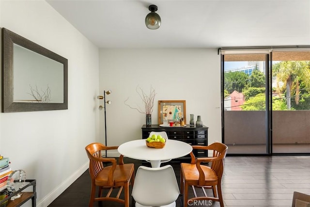930 N Wetherly Dr Unit 201, West Hollywood, CA 90069 - dining room with wood finished floors and baseboards