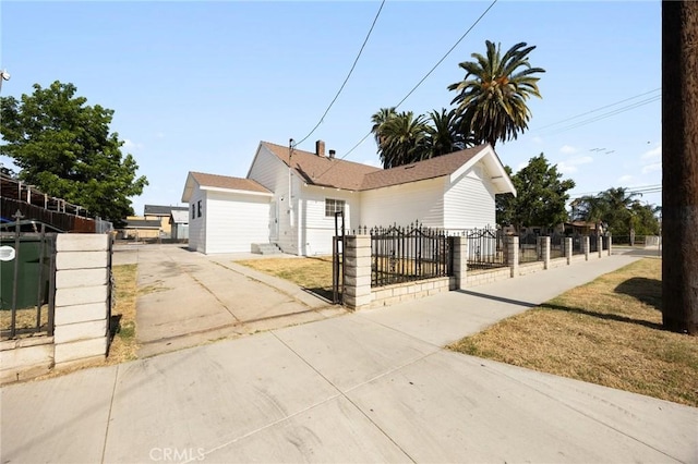 594 W 10th St, San Bernardino, CA 92410 - view of front of house featuring a fenced front yard