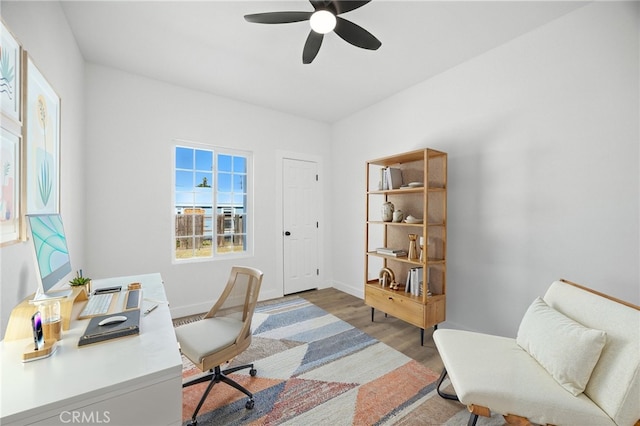 594 W 10th St, San Bernardino, CA 92410 - office with a ceiling fan and wood finished floors