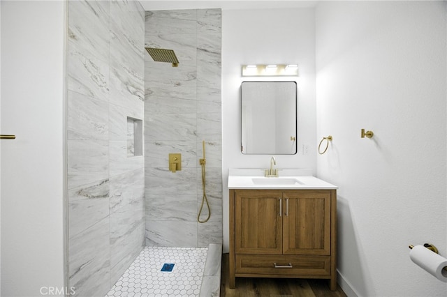 594 W 10th St, San Bernardino, CA 92410 - full bath featuring a marble finish shower, vanity, and wood finished floors
