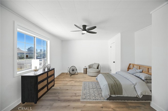 594 W 10th St, San Bernardino, CA 92410 - bedroom with wood finished floors and a ceiling fan