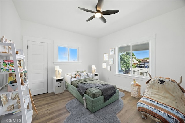 594 W 10th St, San Bernardino, CA 92410 - bedroom with wood finished floors and ceiling fan