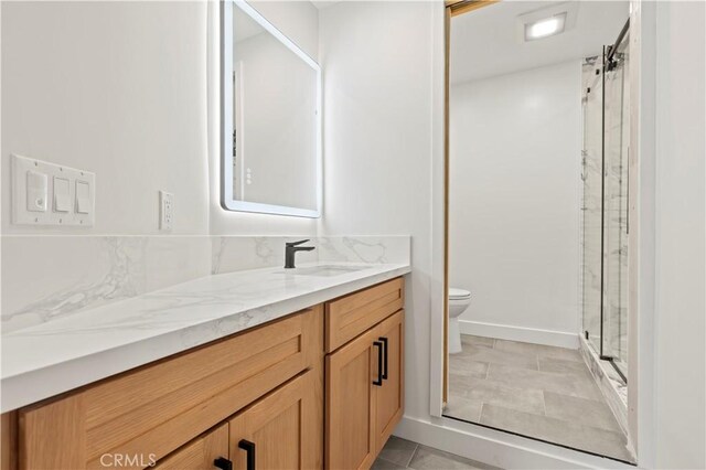 8280 Grand View Dr, Los Angeles, CA 90046 - full bath featuring vanity, a marble finish shower, and tile patterned flooring