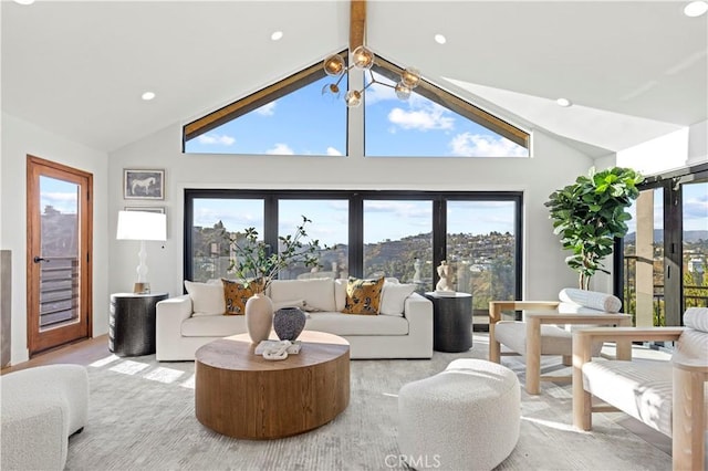 8280 Grand View Dr, Los Angeles, CA 90046 - living area with lofted ceiling, plenty of natural light, and recessed lighting