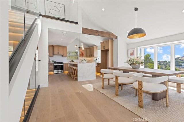 8280 Grand View Dr, Los Angeles, CA 90046 - dining space with light wood-style flooring, recessed lighting, healthy amount of natural light, stairway, and high vaulted ceiling