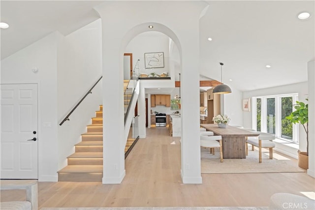 8280 Grand View Dr, Los Angeles, CA 90046 - entrance foyer with light wood-type flooring, stairs, high vaulted ceiling, and recessed lighting