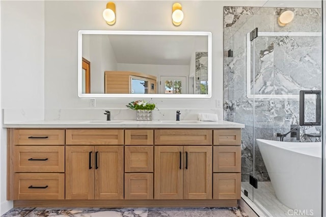 8280 Grand View Dr, Los Angeles, CA 90046 - full bath with double vanity, a freestanding tub, a shower stall, and marble look tile flooring