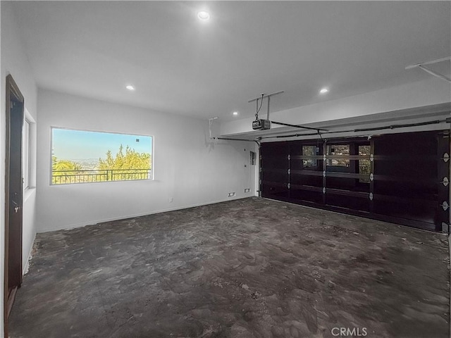 8280 Grand View Dr, Los Angeles, CA 90046 - garage featuring recessed lighting and a garage door opener