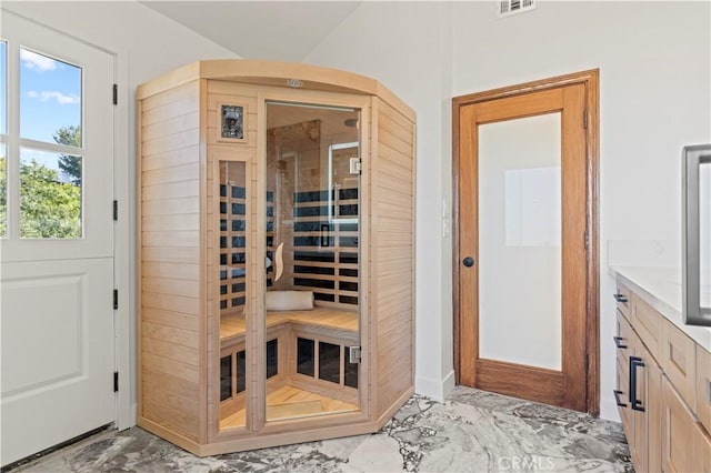 8280 Grand View Dr, Los Angeles, CA 90046 - relaxing sauna / steam room with marble look tiles
