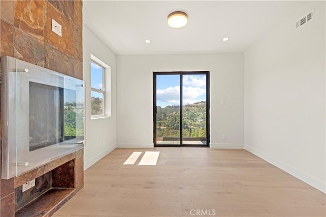 8280 Grand View Dr, Los Angeles, CA 90046 - unfurnished room featuring wood finished floors and recessed lighting