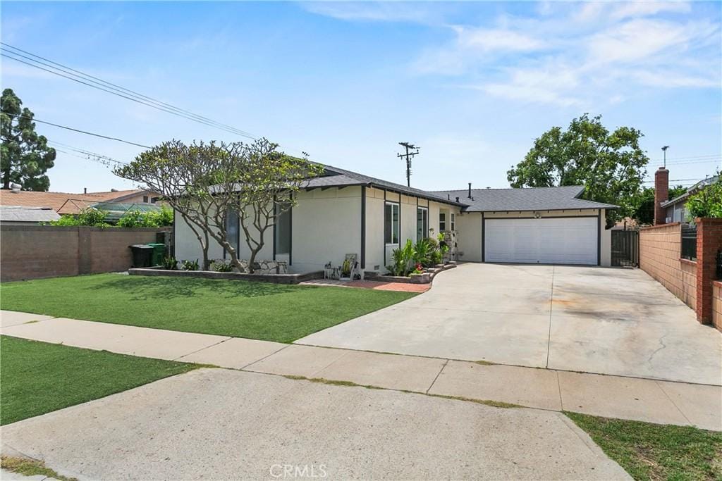 14701 Ontario Dr, Westminster, CA 92683 - mid-century inspired home featuring driveway and an attached garage