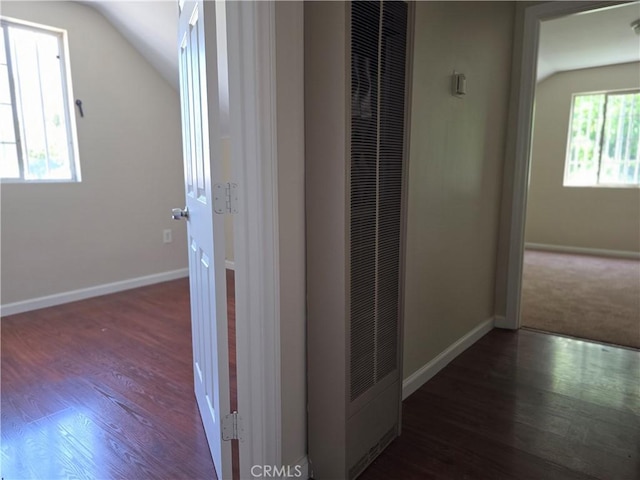 123 E Gage Ave, Los Angeles, CA 90003 - hallway featuring a heating unit, lofted ceiling, and wood finished floors