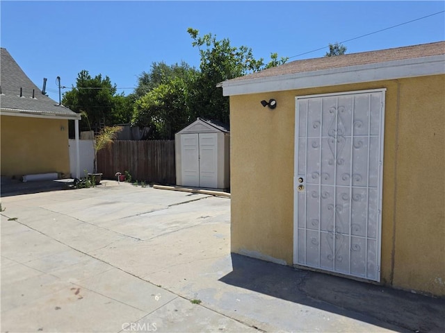 123 E Gage Ave, Los Angeles, CA 90003 - doorway to property with stucco siding and a patio