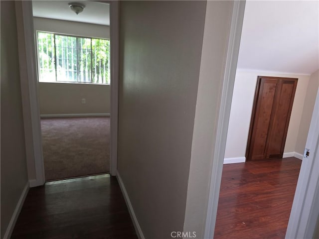 123 E Gage Ave, Los Angeles, CA 90003 - hall with baseboards and dark wood-style floors