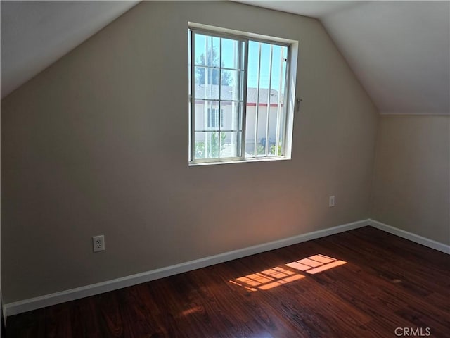 123 E Gage Ave, Los Angeles, CA 90003 - additional living space featuring lofted ceiling and dark wood-type flooring