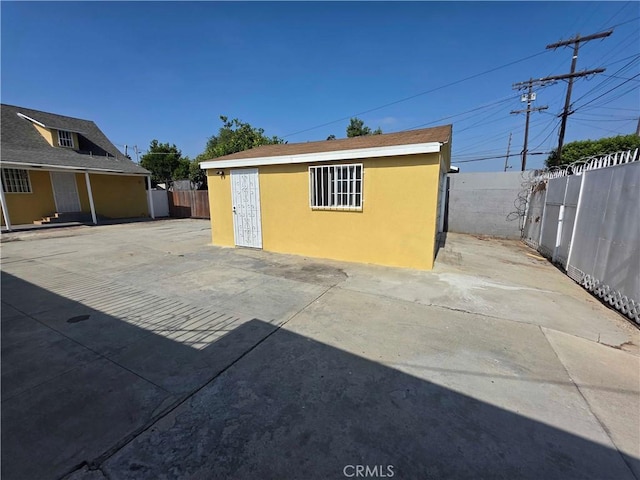 123 E Gage Ave, Los Angeles, CA 90003 - view of outdoor structure featuring a fenced backyard