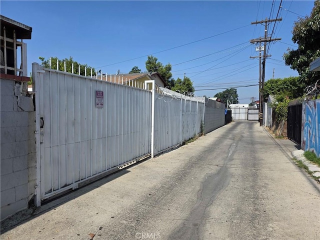 123 E Gage Ave, Los Angeles, CA 90003 - view of road with a gate