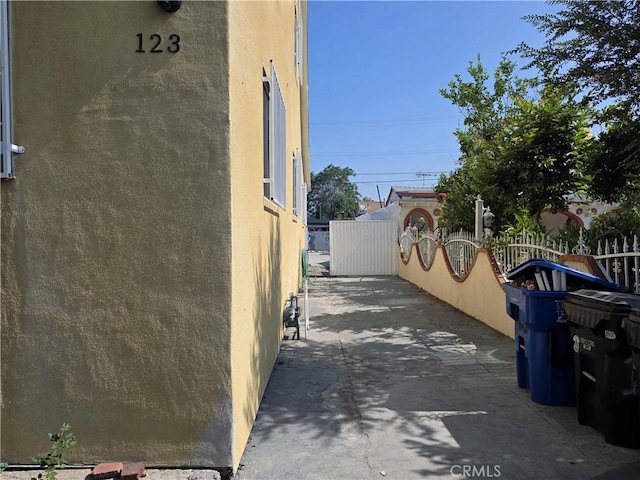 123 E Gage Ave, Los Angeles, CA 90003 - view of home's exterior featuring stucco siding