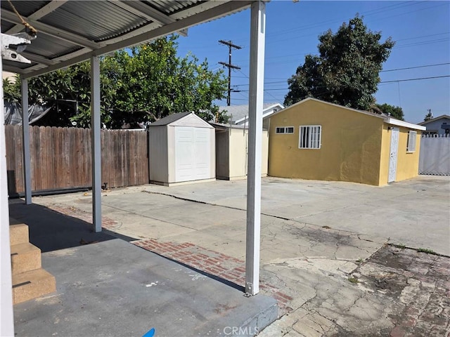 123 E Gage Ave, Los Angeles, CA 90003 - view of patio / terrace featuring a storage shed