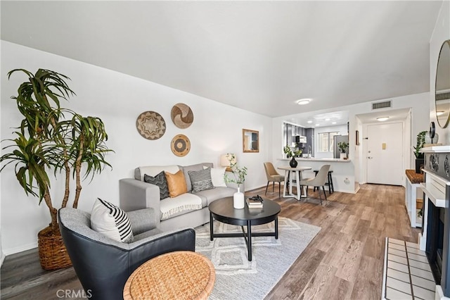 628 Daisy Ave Unit 316, Long Beach, CA 90802 - living area with wood finished floors
