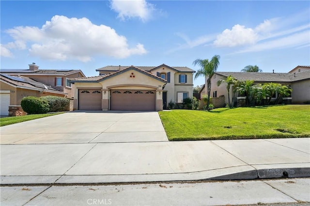31258 Shadow Ridge Dr, Menifee, CA 92584 - mediterranean / spanish house featuring stucco siding, an attached garage, concrete driveway, and a front lawn