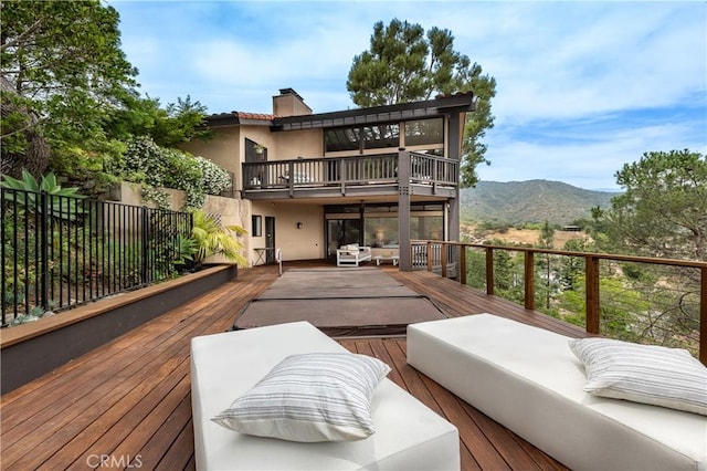 1960 Polaris Dr, Glendale, CA 91208 - wooden terrace with a mountain view and an outdoor hangout area