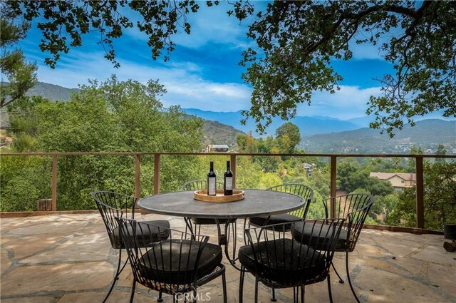 1960 Polaris Dr, Glendale, CA 91208 - view of patio featuring outdoor dining space and a mountain view