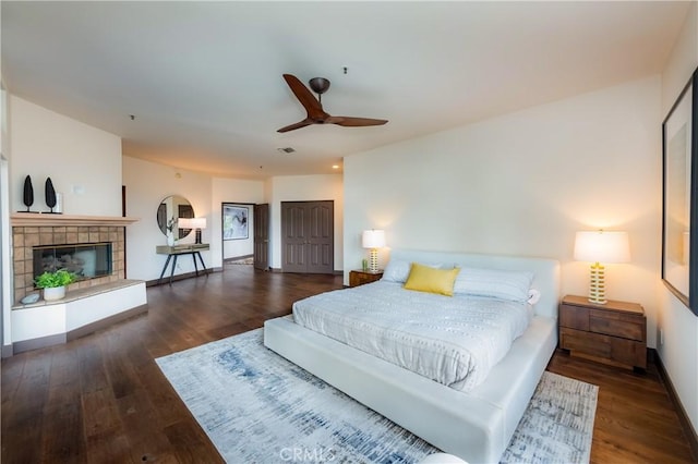 1960 Polaris Dr, Glendale, CA 91208 - bedroom with wood finished floors, recessed lighting, a tiled fireplace, and ceiling fan