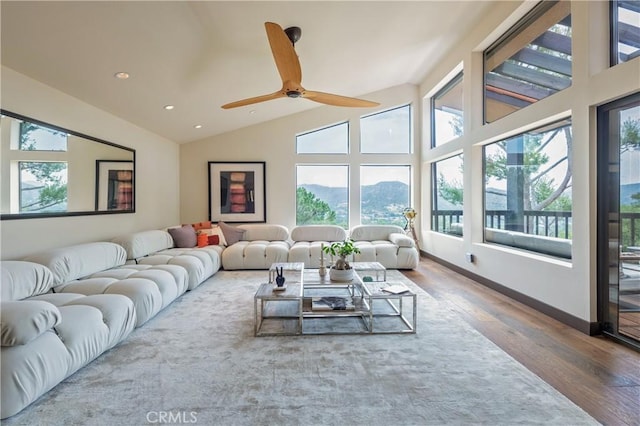 1960 Polaris Dr, Glendale, CA 91208 - living area with wood finished floors, recessed lighting, ceiling fan, a mountain view, and vaulted ceiling