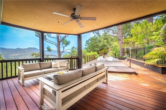 1960 Polaris Dr, Glendale, CA 91208 - wooden terrace with an outdoor hangout area, ceiling fan, and a mountain view