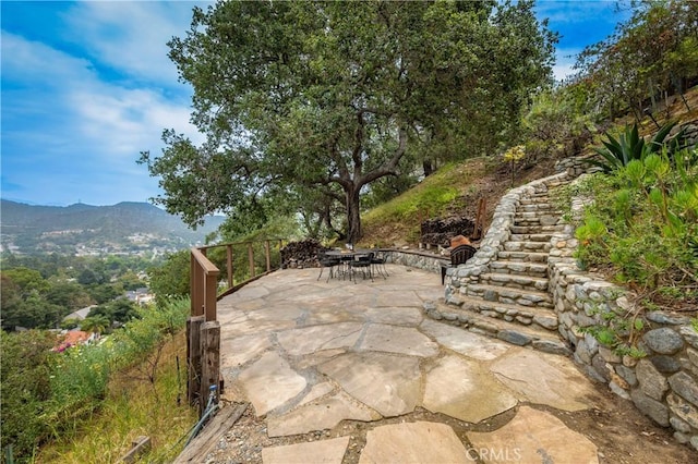 1960 Polaris Dr, Glendale, CA 91208 - view of patio / terrace with a mountain view and outdoor dining space