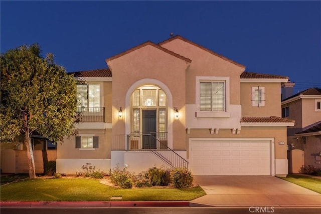 3120 Tara, Costa Mesa, CA 92626 - mediterranean / spanish house with driveway, a garage, a yard, a tile roof, and stucco siding
