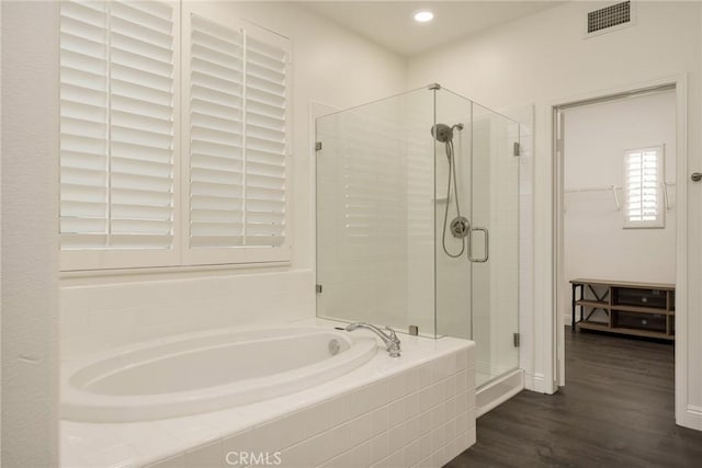 3120 Tara, Costa Mesa, CA 92626 - full bathroom with a bath, a shower stall, wood finished floors, and recessed lighting