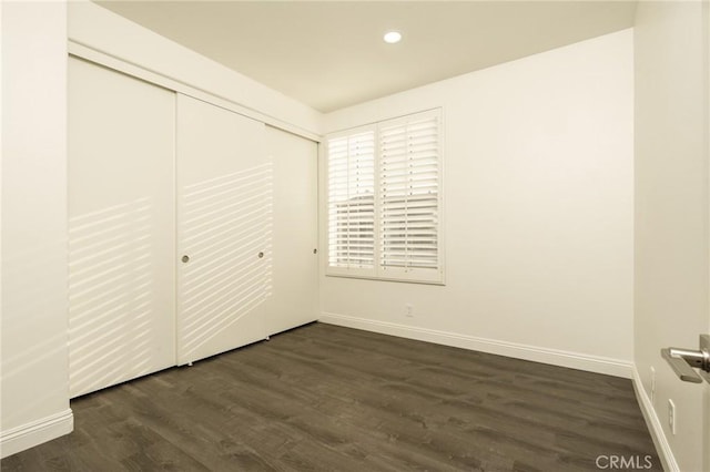 3120 Tara, Costa Mesa, CA 92626 - unfurnished bedroom featuring dark wood-style floors, recessed lighting, and a closet