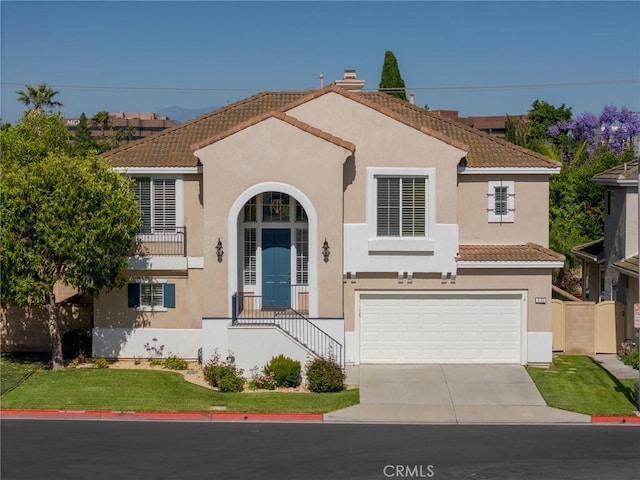3120 Tara, Costa Mesa, CA 92626 - mediterranean / spanish house with driveway, an attached garage, stucco siding, and a tiled roof