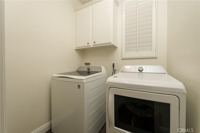 3120 Tara, Costa Mesa, CA 92626 - laundry room with cabinet space and washer and clothes dryer