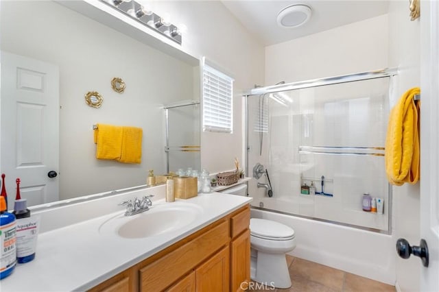 67760 Rio Vista Dr, Cathedral City, CA 92234 - full bath with vanity, combined bath / shower with glass door, and tile patterned floors