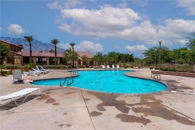 67760 Rio Vista Dr, Cathedral City, CA 92234 - community pool featuring a patio area and a mountain view