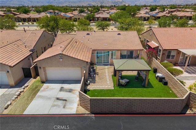 67760 Rio Vista Dr, Cathedral City, CA 92234 - view of front of home featuring a residential view, a gazebo, a tiled roof, and stucco siding