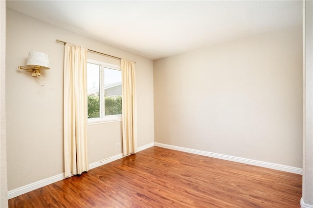 131 N Dommer Ave, Walnut, CA 91789 - empty room featuring wood finished floors and baseboards